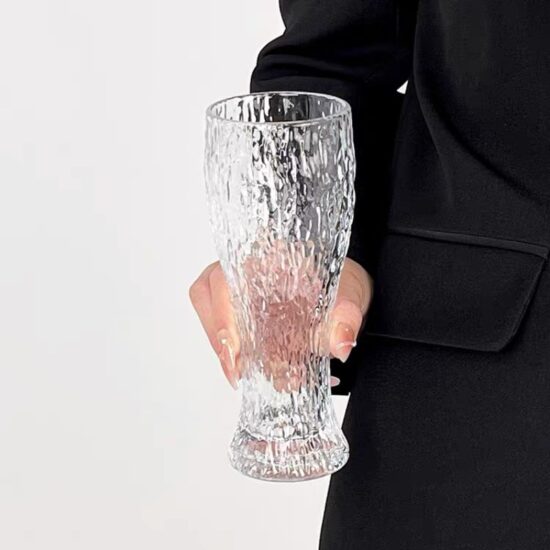 Hammered glass beer mug with retro style for craft drinks and water